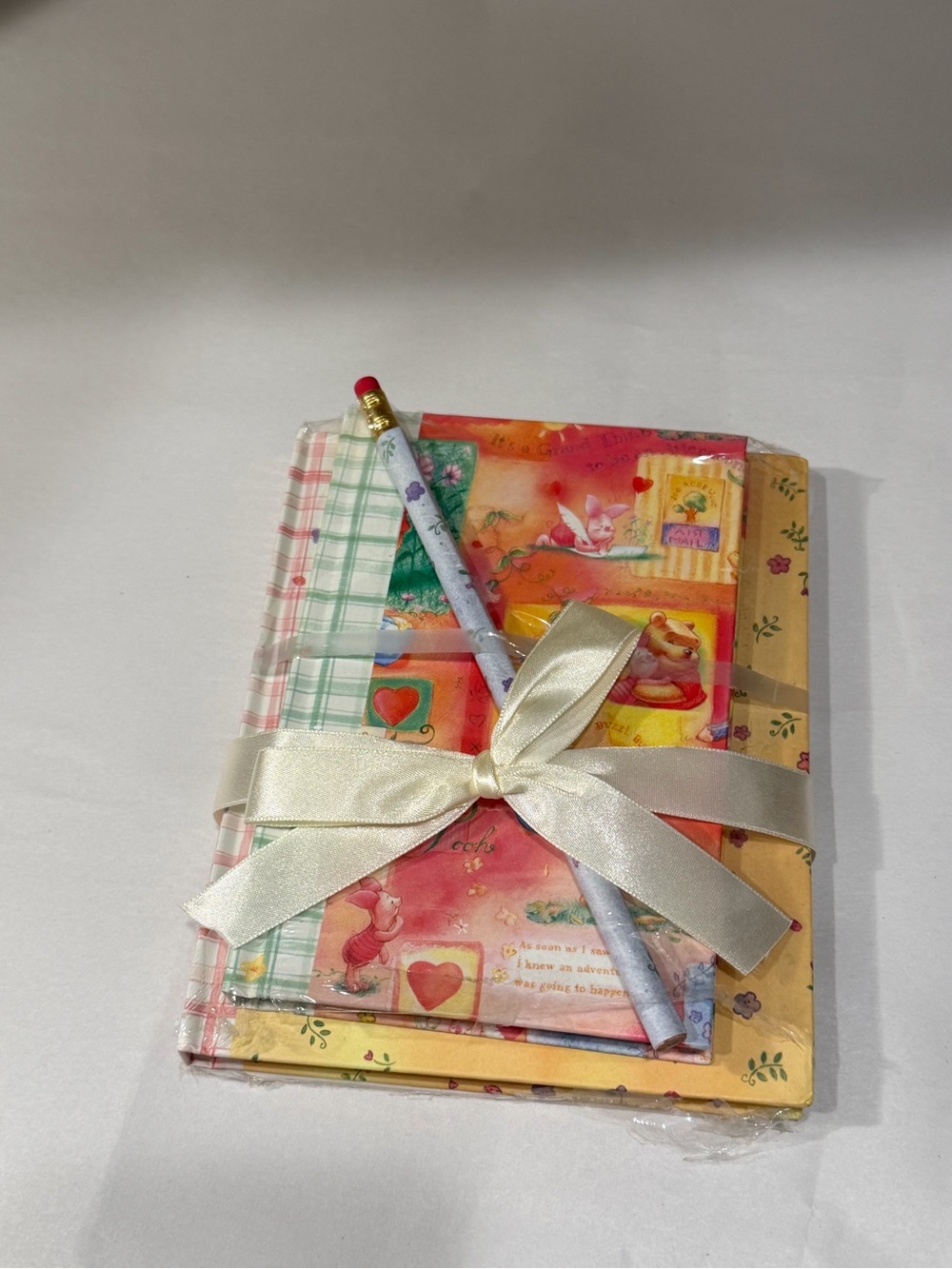 Winni Pooh Cream Ribbon Wrapped Pink & Yellow Party Notebook Set